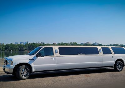 White Stretch SUV Limo for up 12 people.